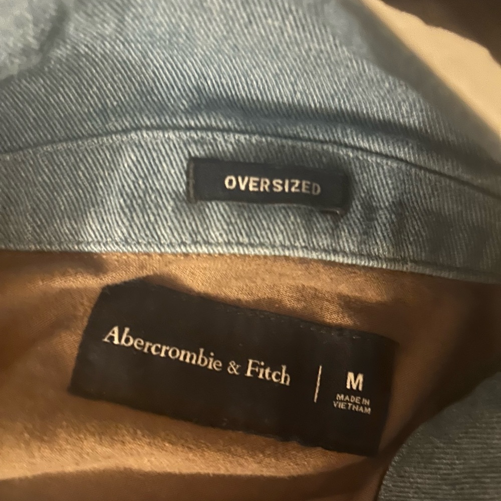 Brown shirt. White and blue collar. Men’s. Oversized Medium.